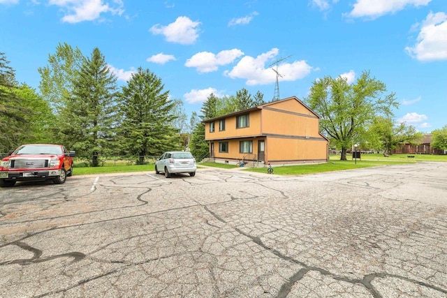 521 E Grand Ave, Rosholt, WI 54473 - view of property featuring uncovered parking