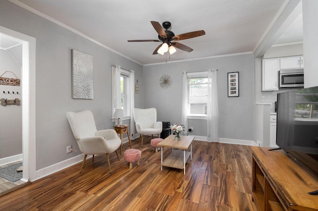 2801 Harvey St, La Crosse, WI 54603 - living area featuring wood finished floors, baseboards, a ceiling fan, and ornamental molding