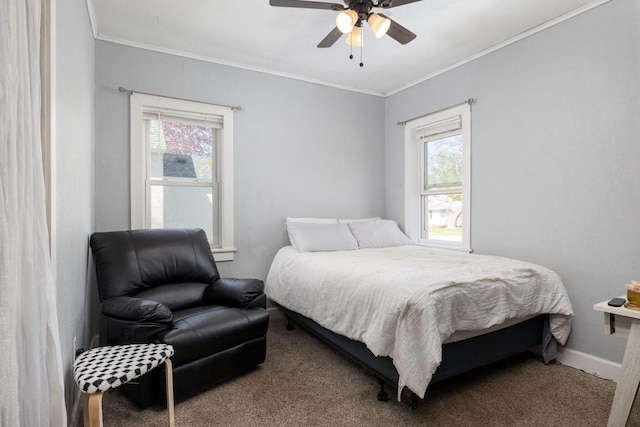 2801 Harvey St, La Crosse, WI 54603 - carpeted bedroom with multiple windows, ornamental molding, baseboards, and a ceiling fan