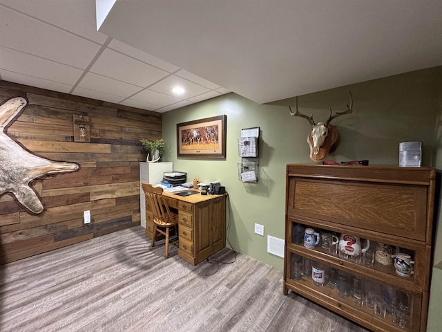 N3140 Forest Prairie Park Rd, Monroe, WI 53566 - office space featuring wood walls, wood finished floors, a paneled ceiling, and recessed lighting