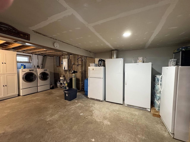 N3140 Forest Prairie Park Rd, Monroe, WI 53566 - unfinished basement with freestanding refrigerator, electric panel, and independent washer and dryer