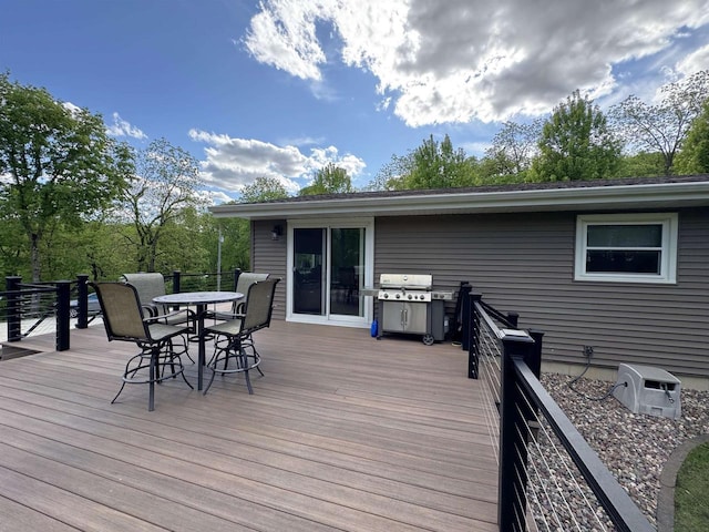 N3140 Forest Prairie Park Rd, Monroe, WI 53566 - deck featuring outdoor dining space and area for grilling