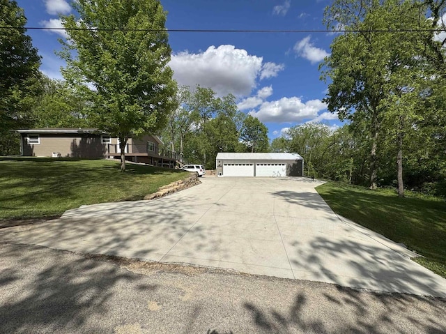 N3140 Forest Prairie Park Rd, Monroe, WI 53566 - view of front of home with an outbuilding, a front lawn, and a garage
