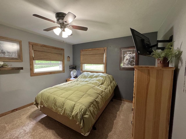 N3140 Forest Prairie Park Rd, Monroe, WI 53566 - bedroom with carpet, baseboards, and ceiling fan