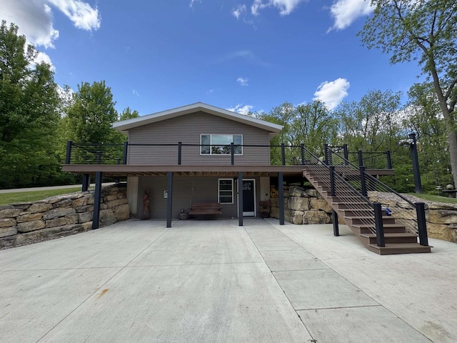 N3140 Forest Prairie Park Rd, Monroe, WI 53566 - view of front facade with a deck and stairs