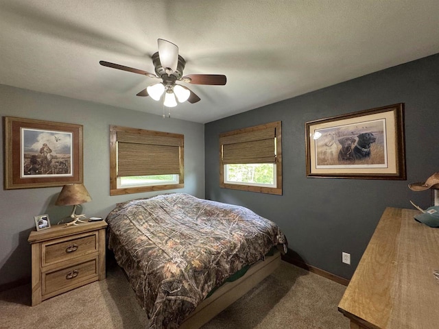 N3140 Forest Prairie Park Rd, Monroe, WI 53566 - bedroom with light carpet, ceiling fan, and baseboards