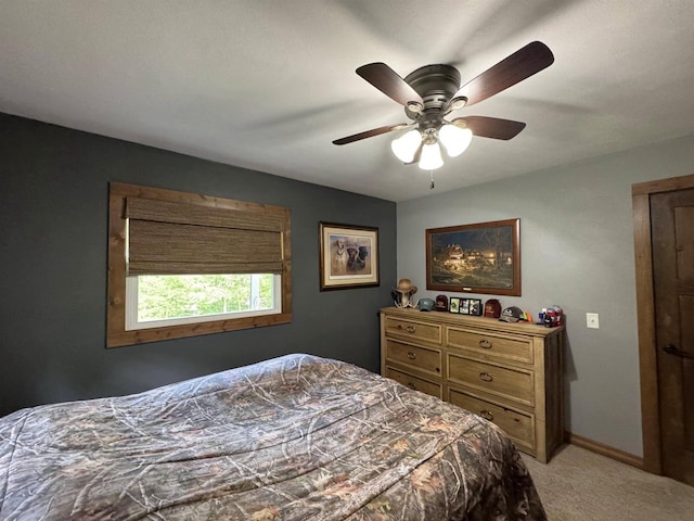 N3140 Forest Prairie Park Rd, Monroe, WI 53566 - bedroom featuring light carpet, a ceiling fan, and baseboards