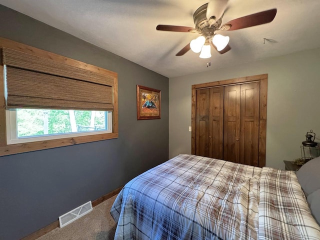 N3140 Forest Prairie Park Rd, Monroe, WI 53566 - carpeted bedroom with a closet, ceiling fan, and baseboards