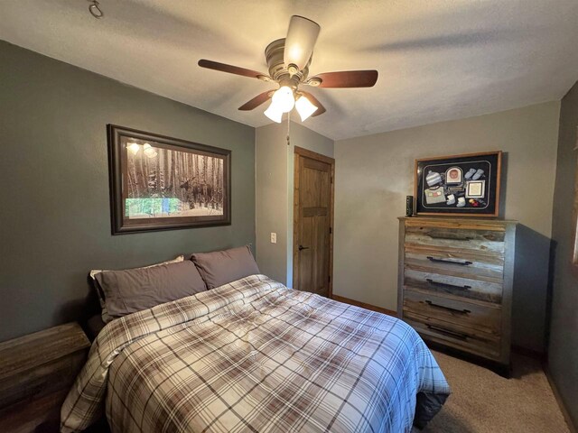 N3140 Forest Prairie Park Rd, Monroe, WI 53566 - carpeted bedroom featuring ceiling fan