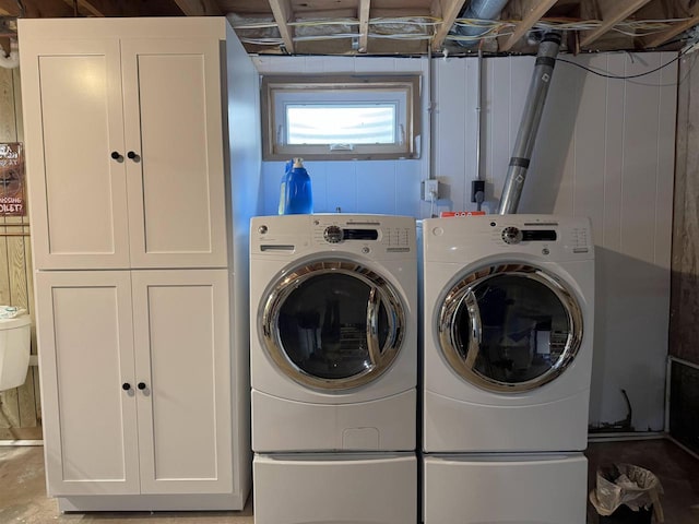 N3140 Forest Prairie Park Rd, Monroe, WI 53566 - washroom with separate washer and dryer and cabinet space