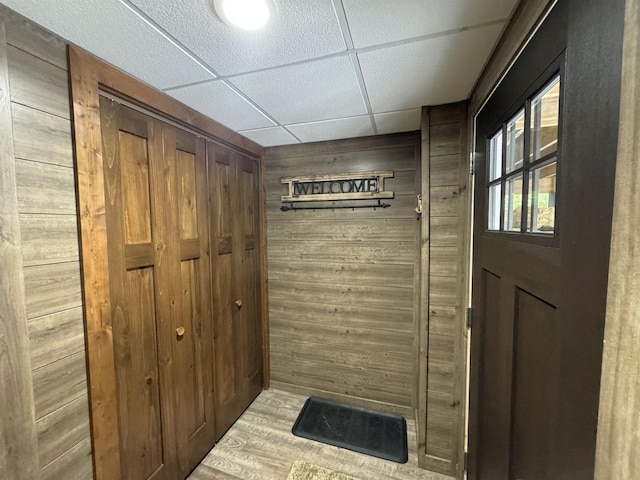 N3140 Forest Prairie Park Rd, Monroe, WI 53566 - doorway with wood walls and a paneled ceiling