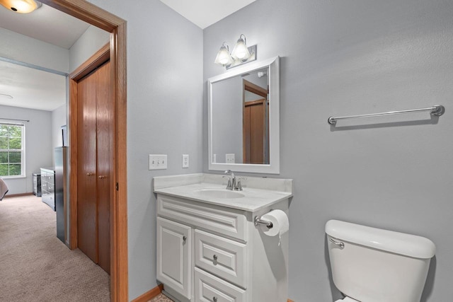 10 Kings Mill Cir Unit 113, Madison, WI 53718 - half bathroom featuring toilet and vanity