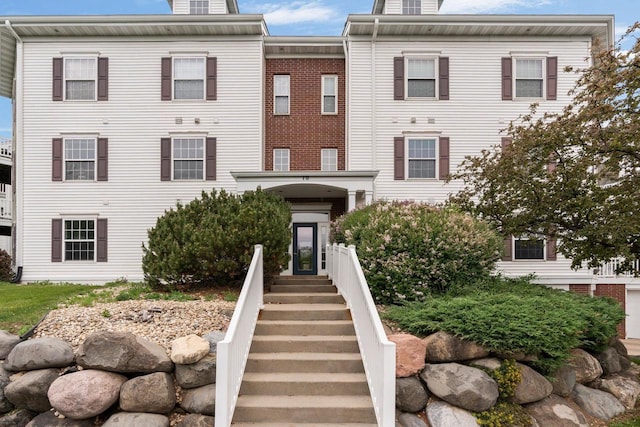 10 Kings Mill Cir Unit 113, Madison, WI 53718 - view of front of home with a chimney