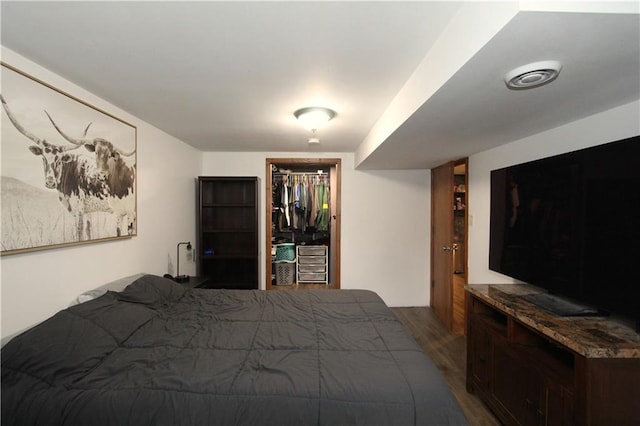 1808 Curtiss St, Eau Claire, WI 54703 - bedroom with dark wood-type flooring and a closet