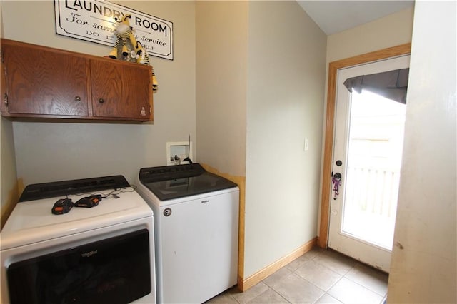1808 Curtiss St, Eau Claire, WI 54703 - washroom with cabinet space, washing machine and clothes dryer, baseboards, and light tile patterned floors
