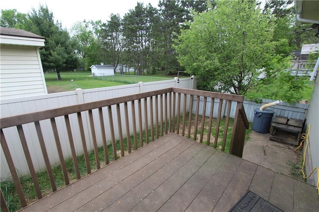 1808 Curtiss St, Eau Claire, WI 54703 - wooden deck with a fenced backyard and view of scattered trees