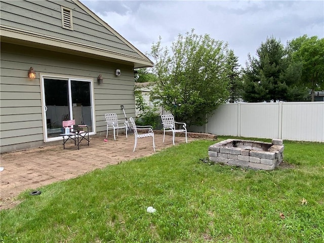 1808 Curtiss St, Eau Claire, WI 54703 - view of yard featuring an outdoor fire pit and a patio area