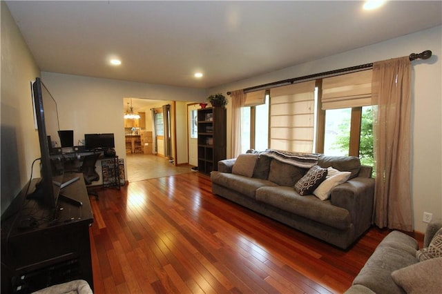 1808 Curtiss St, Eau Claire, WI 54703 - living area with wood-type flooring, a chandelier, and recessed lighting