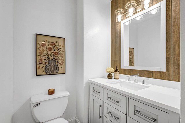 6112 W Port Ave, Milwaukee, WI 53223 - half bathroom featuring toilet and vanity