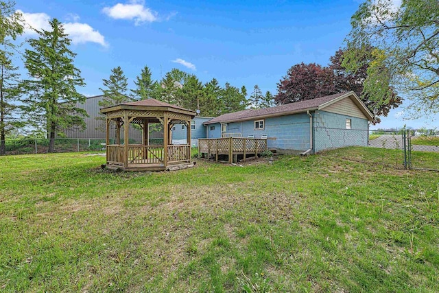 N10678 US Highway 151, Malone, WI 53049 - rear view of house with a gazebo, a wooden deck, and a gate