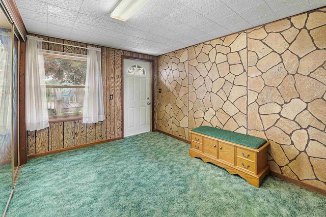 N10678 US Highway 151, Malone, WI 53049 - carpeted spare room with wooden walls and baseboards