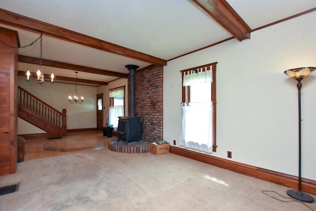 735 Oakwood St, Wild Rose, WI 54984 - unfurnished living room with a wood stove, beamed ceiling, stairway, baseboards, and a chandelier