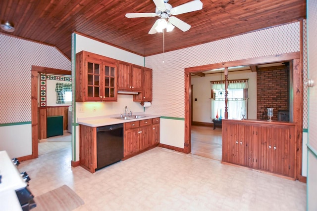 735 Oakwood St, Wild Rose, WI 54984 - kitchen with black dishwasher, wallpapered walls, a sink, light flooring, and baseboards