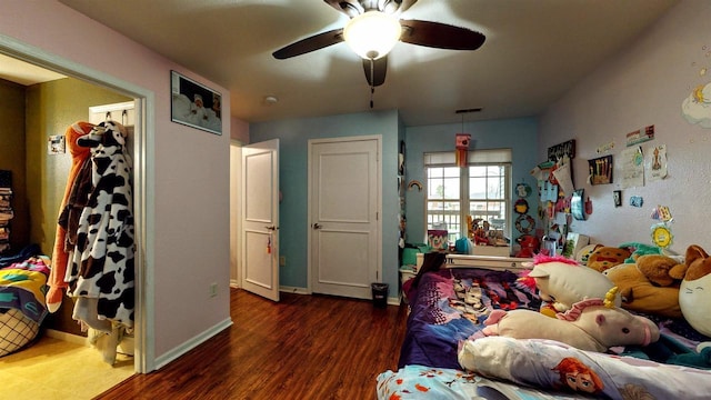 619 Reena Ave Unit 8, Fort Atkinson, WI 53538 - bedroom featuring wood finished floors, baseboards, and a ceiling fan