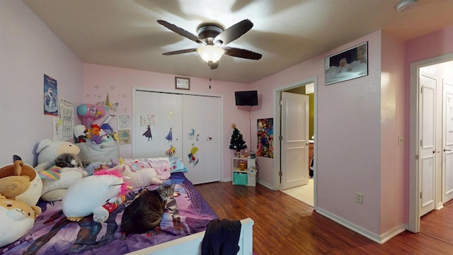 619 Reena Ave Unit 8, Fort Atkinson, WI 53538 - bedroom with wood finished floors, baseboards, a ceiling fan, and a closet