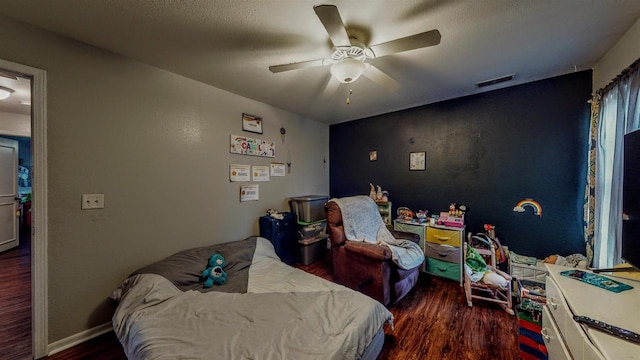 619 Reena Ave Unit 8, Fort Atkinson, WI 53538 - bedroom featuring wood finished floors, ceiling fan, and baseboards