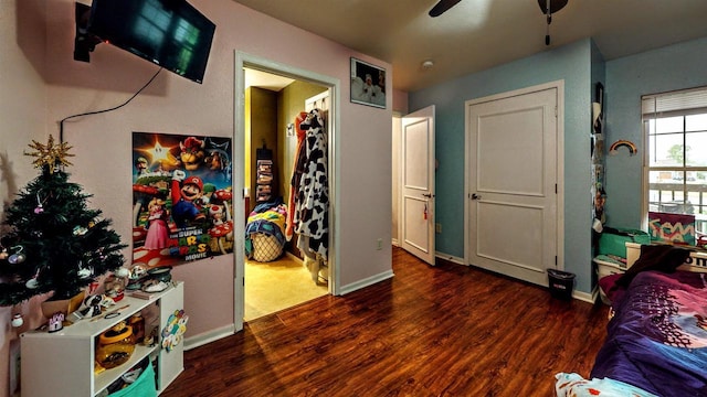 619 Reena Ave Unit 8, Fort Atkinson, WI 53538 - bedroom with wood finished floors, baseboards, and a ceiling fan