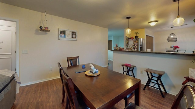619 Reena Ave Unit 8, Fort Atkinson, WI 53538 - dining room with wood finished floors and baseboards