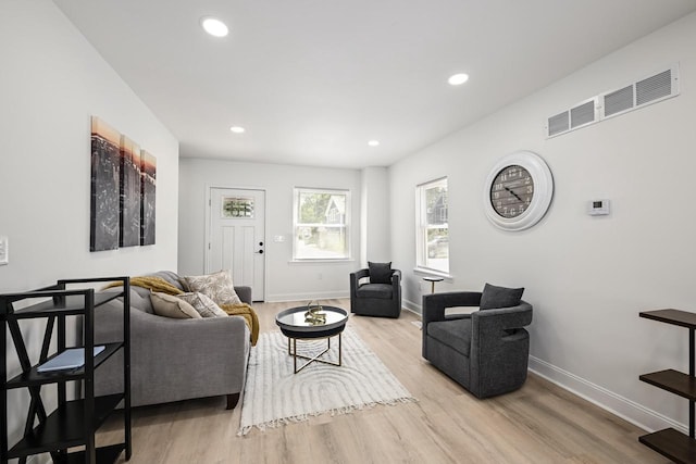 1922 E Iron St, Milwaukee, WI 53207 - living room featuring wood finished floors, baseboards, and recessed lighting