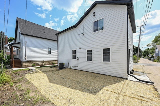 1922 E Iron St, Milwaukee, WI 53207 - back of property featuring central AC unit and a shingled roof