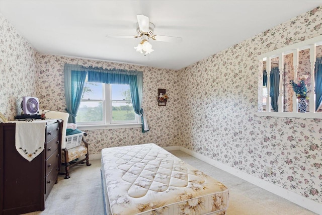 N1815 County Road T, Brodhead, WI 53520 - carpeted bedroom with wallpapered walls and a ceiling fan