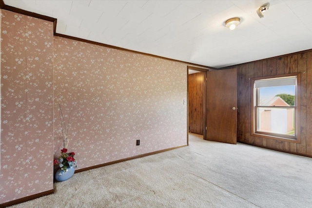N1815 County Road T, Brodhead, WI 53520 - empty room featuring crown molding, carpet floors, and wallpapered walls
