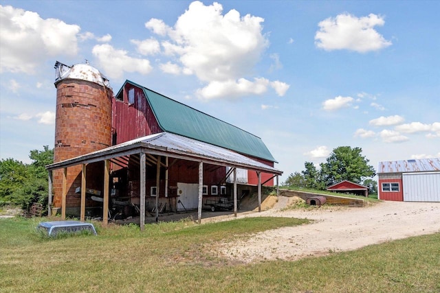 N1815 County Road T, Brodhead, WI 53520 - view of barn featuring dirt driveway