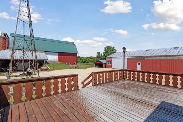 N1815 County Road T, Brodhead, WI 53520 - wooden terrace with an outbuilding