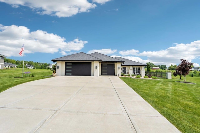 7678 Badger Run Ct, Verona, WI 53593 - prairie-style home featuring an attached garage, concrete driveway, and stucco siding