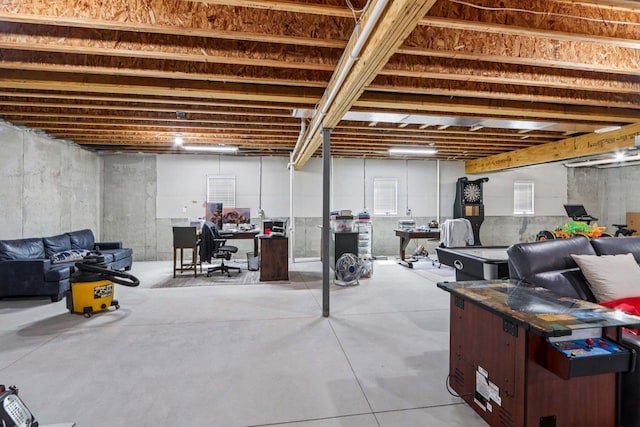 7678 Badger Run Ct, Verona, WI 53593 - unfinished basement featuring a desk