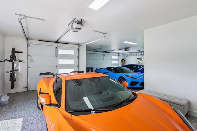 7678 Badger Run Ct, Verona, WI 53593 - garage featuring a garage door opener