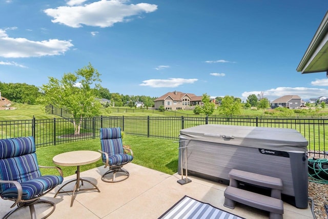 7678 Badger Run Ct, Verona, WI 53593 - view of patio / terrace with a hot tub and a residential view