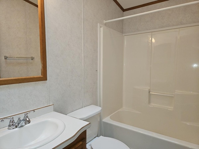 7102 Fire Tower Rd, Rhinelander, WI 54501 - bathroom featuring toilet, vanity, tub / shower combination, and ornamental molding
