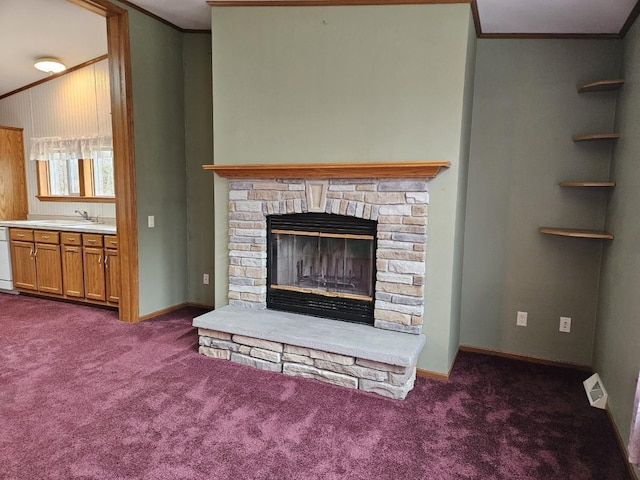 7102 Fire Tower Rd, Rhinelander, WI 54501 - detailed view of carpet floors, ornamental molding, a fireplace, and white dishwasher