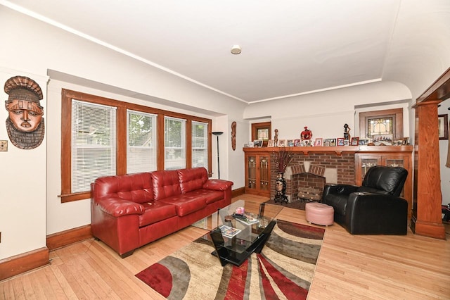 2355 N 59th St Unit 2357, Milwaukee, WI 53210 - living area featuring baseboards, light wood-style floors, and a fireplace