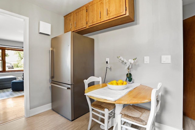 3725 Dawes St, Madison, WI 53714 - dining room with baseboards and light wood-style flooring
