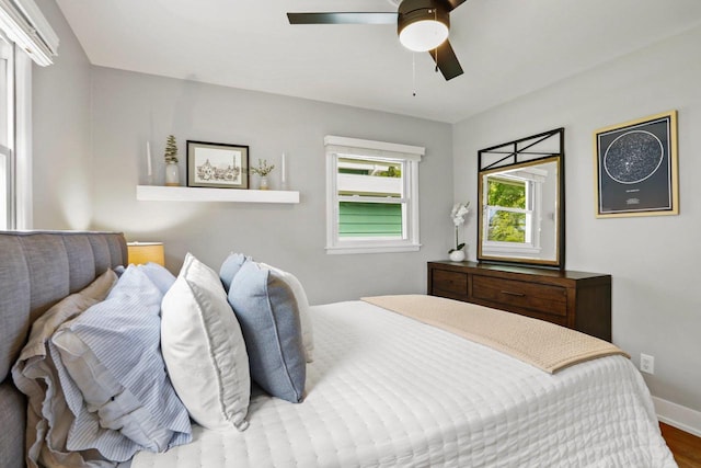 3725 Dawes St, Madison, WI 53714 - bedroom with baseboards, wood finished floors, and ceiling fan
