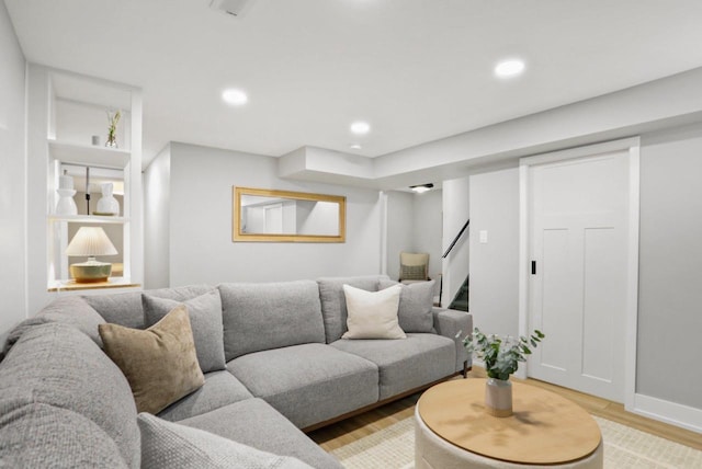 3725 Dawes St, Madison, WI 53714 - living area with light wood-style flooring, stairs, recessed lighting, and baseboards