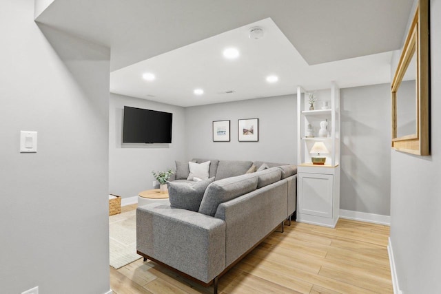 3725 Dawes St, Madison, WI 53714 - living area featuring baseboards, light wood-type flooring, and recessed lighting