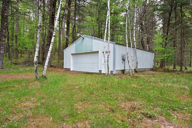 2775 Lake Rd, Barnes, WI 54873 - detached garage with a wooded view